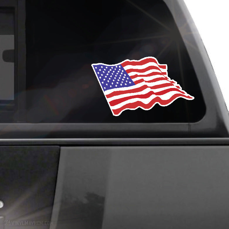 American flag decal on a car window