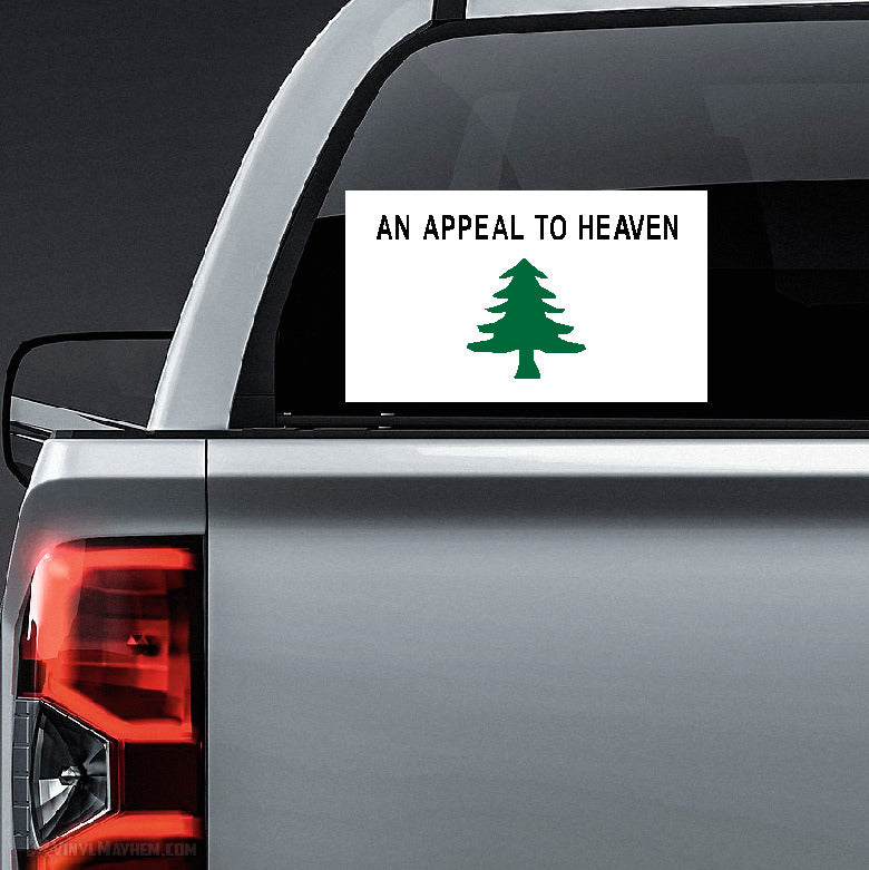 Car window with a decal featuring 'An Appeal to Heaven' and a green tree on a white background.