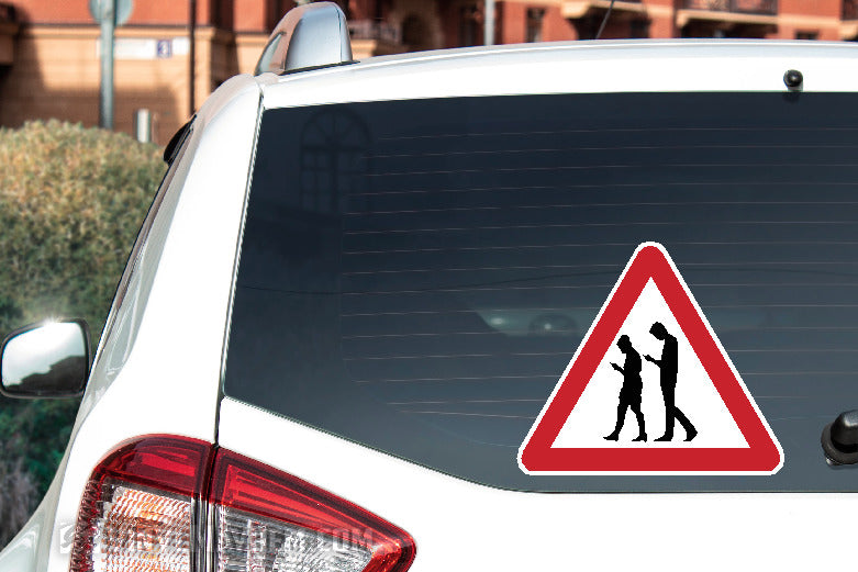 Yield to pedestrians texting caution sticker