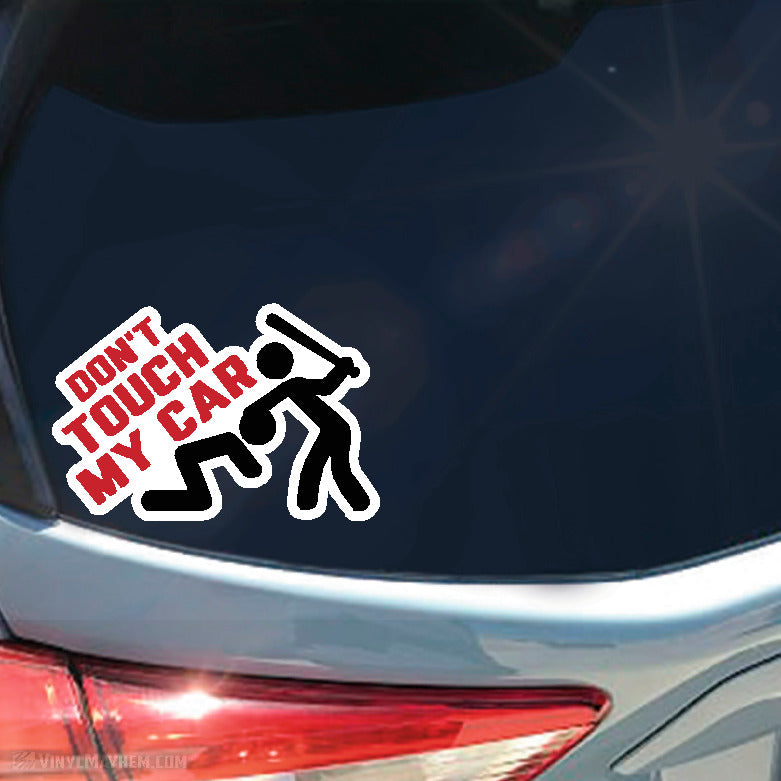 Car sticker with 'Don't Touch My Car' text and graphic on a vehicle's rear window.