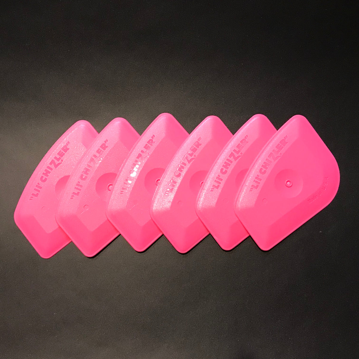 Six Lil’ Chizler scraper removal and installation tools