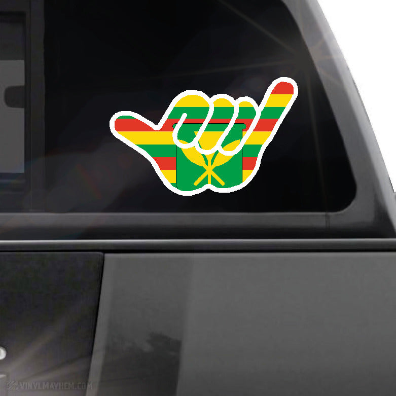 Colorful fist-shaped decal on a car window