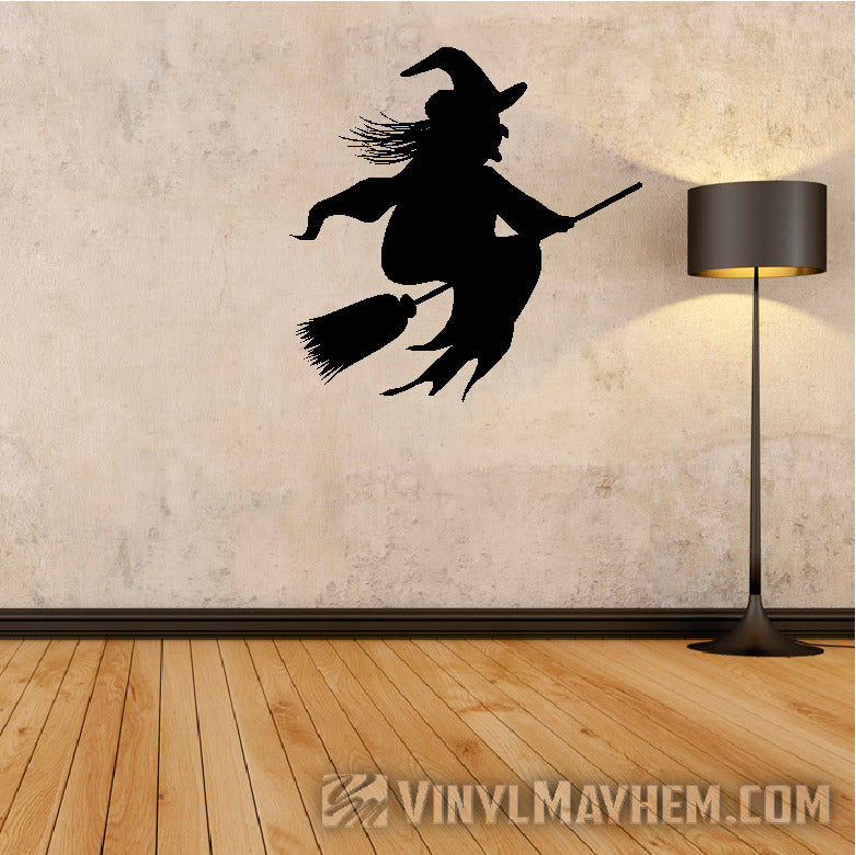 Witch riding broom Halloween vinyl sticker