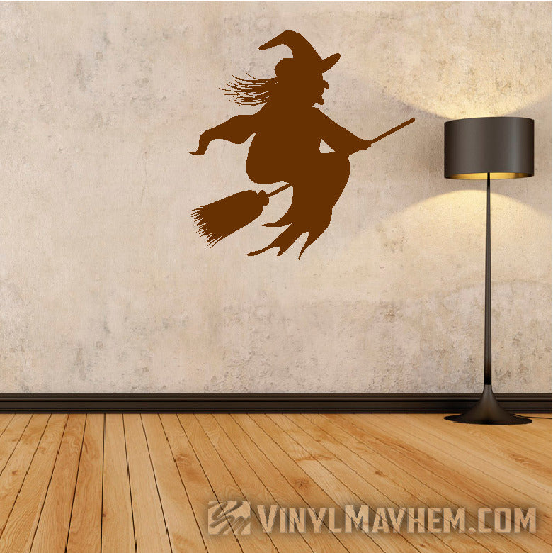 Witch riding broom Halloween vinyl sticker