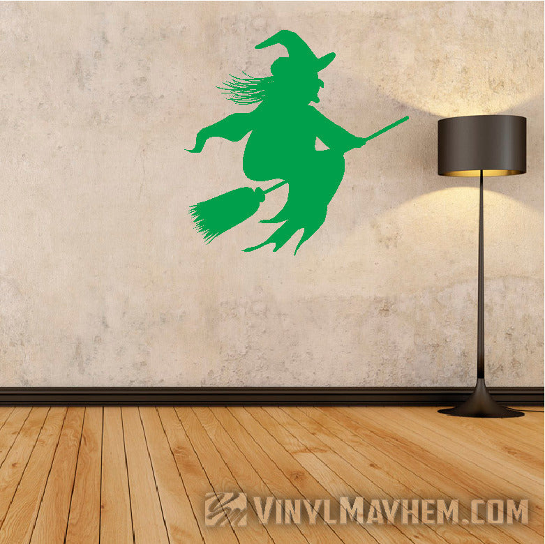 Witch riding broom Halloween vinyl sticker