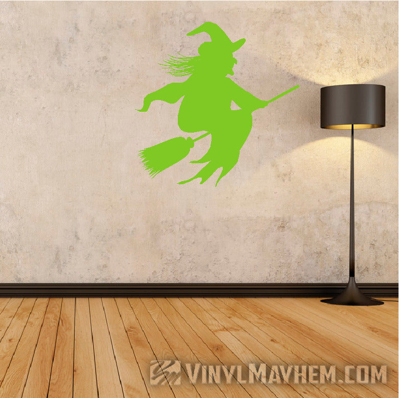 Witch riding broom Halloween vinyl sticker