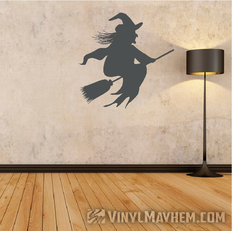 Witch riding broom Halloween vinyl sticker