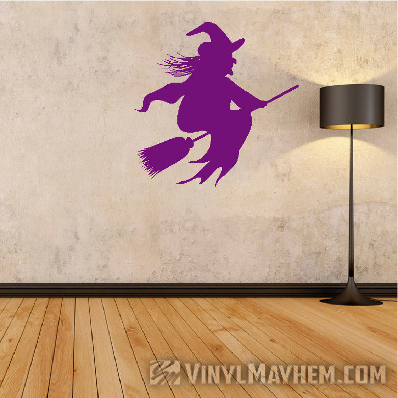 Witch riding broom Halloween vinyl sticker