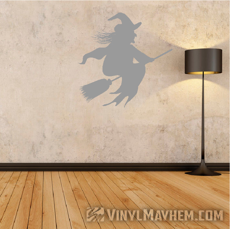 Witch riding broom Halloween vinyl sticker