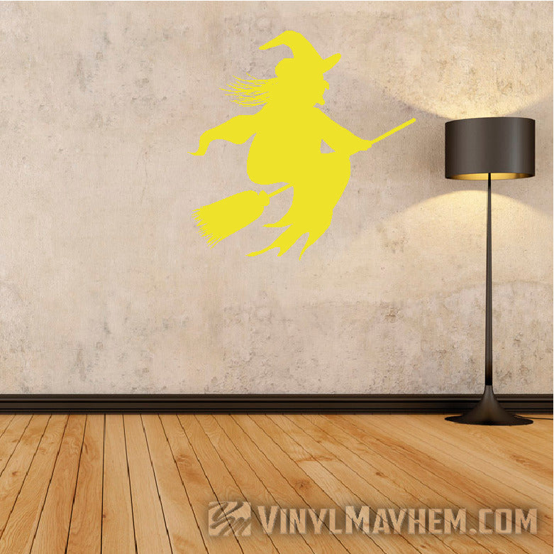 Witch riding broom Halloween vinyl sticker